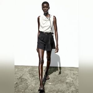 BELTED COMBINATION SHORT JUMPSUIT SIZE M